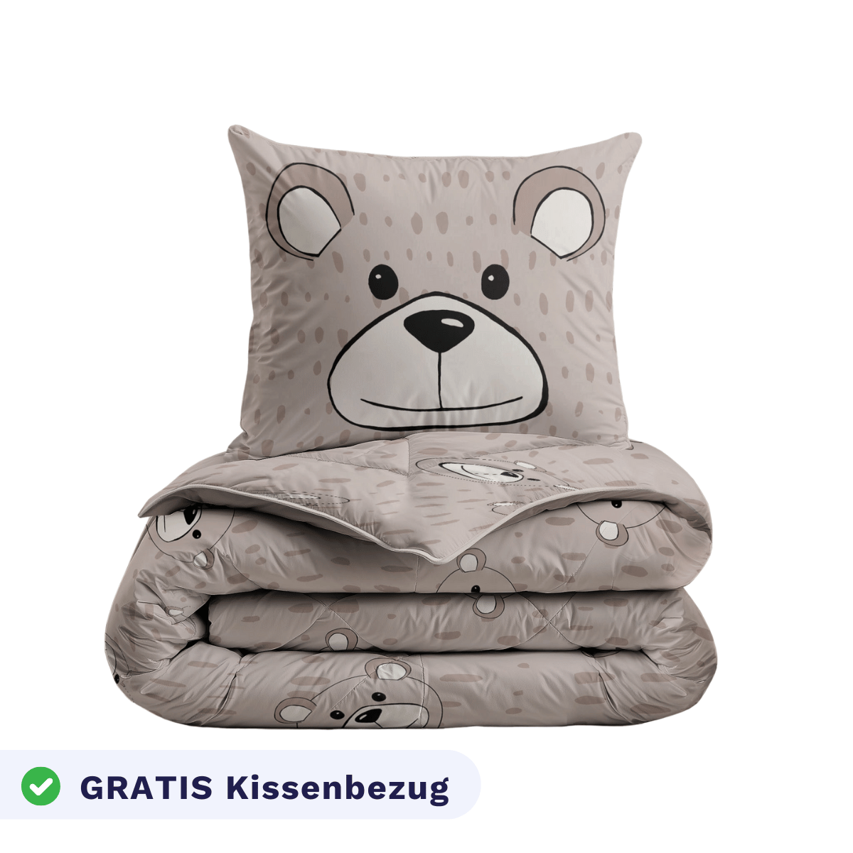 Das gefaltete Zelesta Kiddybed - Happy Bear Set zeigt ein beiges Bärengesicht, enthält ein passendes Kissen und eine Bettdecke, ist hypoallergen und ideal für Kinderbetten. Ein Etikett an der Unterseite lautet GRATIS Kissenbezug.