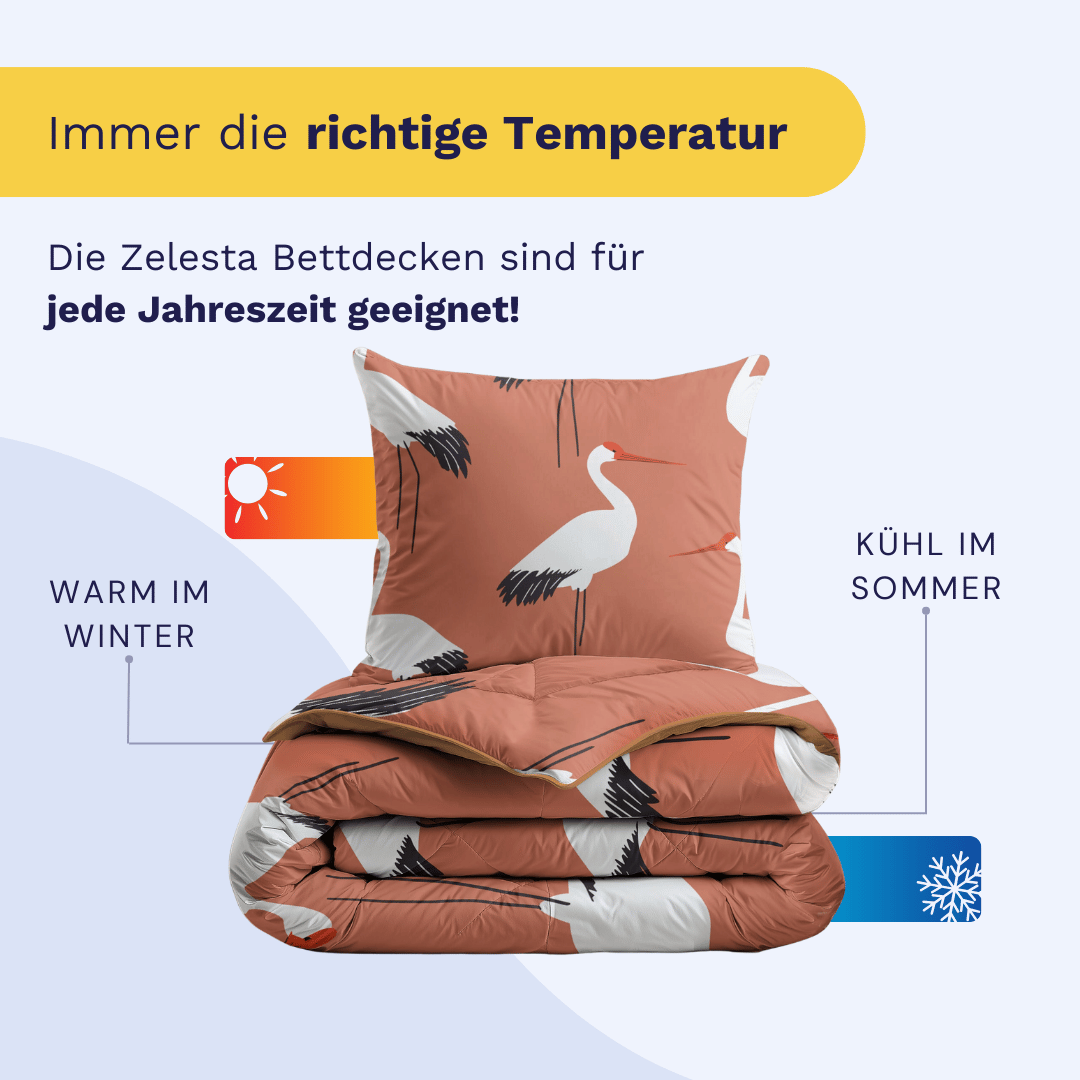Das Zelesta Kiddybed Baumwolle - Terra Crane hat eine temperaturregulierende Bettdecke mit Kranichmuster - warm im Winter, kühl im Sommer. Dieses waschbare Kinderbett ist perfekt für alle Jahreszeiten, was durch die Sonnen- und Schneeflocken-Symbole symbolisiert wird.