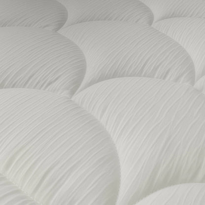 Nahaufnahme der weißen, gesteppten Matratzenoberfläche des Zelesta Flanel Velvetbed Chique - Beige mit erhabenen, kreisförmigen Polstern und einem dezenten Strukturmuster - perfekt für ein luxuriöses Schlafzimmer.